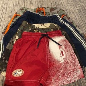 Bundle of 4 assorted size kids swim trunks